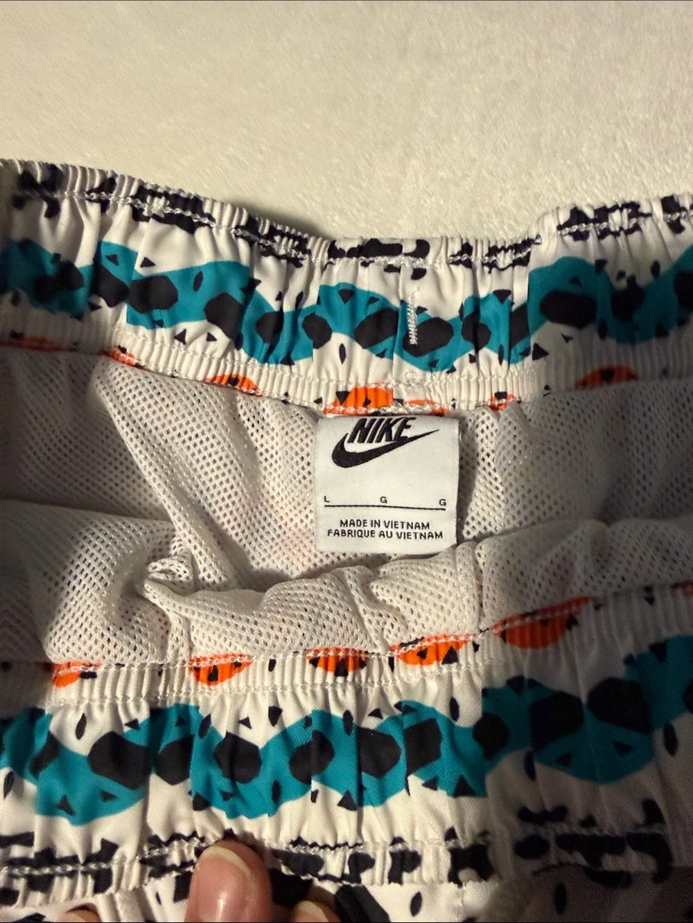 Nike N7 line White Swim Shorts with Teal, Orange & Black Tribal Pattern